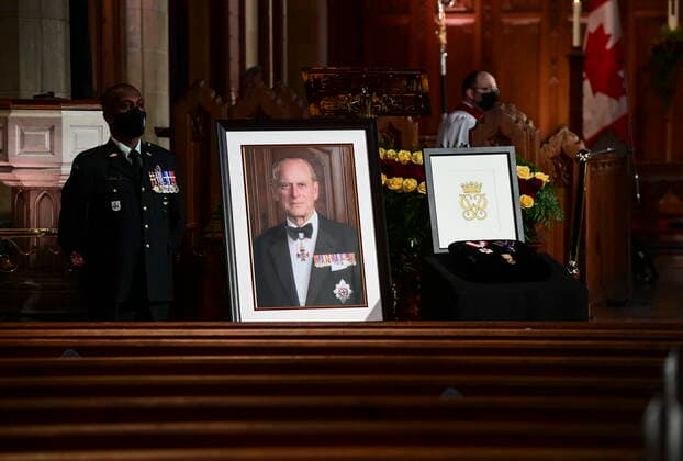 April 17, 2021, Ottawa, on, Canada: CWO G. Seeloch, left, stands beside a portrait of Prince Philip, A framed drawing of the DukeÃ¢â‚¬â ¢s cypher and three Canadian medals awarded to the Duke, during the National Commemorative Ceremony in honour of Prince Philip, The Duke of Edinburgh, at Christ Church Cathedral in Ottawa on Saturday, April 17, 2021. Ottawa Canada  - ZUMAc35_ 20210417_zaf_c35_018 Copyright: xSeanxKilpatrickx