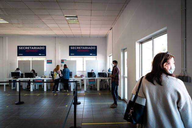 April 17, 2021, Matosinhos, Porto, Portugal: A woman wearing a facemask as a precaution against the spread of covid-19 waits in a line to be vaccinated..The nationwide mass vaccination of teachers and school staff started on 17th April in the Matosinhos Vaccination Centre, 1952 people were vaccinated on the first Saturday with Cominarty vaccine produced by Pfizer. Matosinhos Portugal - ZUMAs197 20210417_zaa_s197_257 Copyright: xTeresaxNunesx