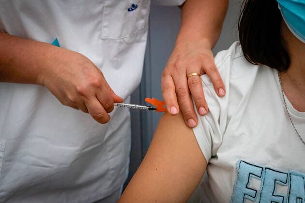 April 17, 2021, Matosinhos, Porto, Portugal: Teacher Fernanda Ribeiro, gets her first shot of the Cominarty vaccine..The nationwide mass vaccination of teachers and school staff started on 17th April in the Matosinhos Vaccination Centre, 1952 people were vaccinated on the first Saturday with Cominarty vaccine produced by Pfizer. Matosinhos Portugal - ZUMAs197 20210417_zaa_s197_262 Copyright: xTeresaxNunesx