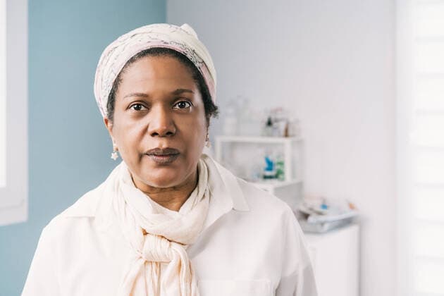 African American mature woman patient at clinic waiting for appointment during appointment, Model released Copyright: xAlvaroxSanchezx MR