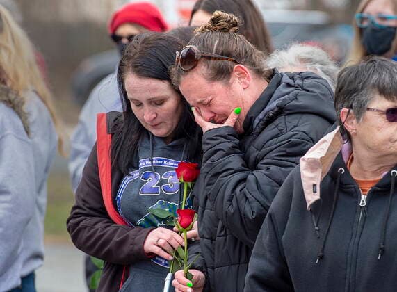 April 18, 2021, Bible Hill, NS, Canada: Family and friends of the victims of the April 2020 murder rampage in rural Nova Scotia, stand outside the RCMP detachment as they mark the one-year anniversary in Bible Hill, N.S. on Sunday, April 18, 2021. Bible Hill Canada  - ZUMAc35_ 20210418_zaf_c35_021 Copyright: xAndrewxVaughanx