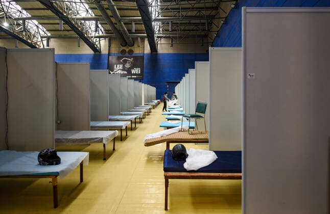 NEW DELHI, INDIA - APRIL 18: An inside view of a temporary Covid care centre set up at Commonwealth Games Village, on April 18, 2021 in New Delhi, India. (Photo by Amal KS Hindustan Times) Daily Life Amid Coronavirus Pandemic In India
