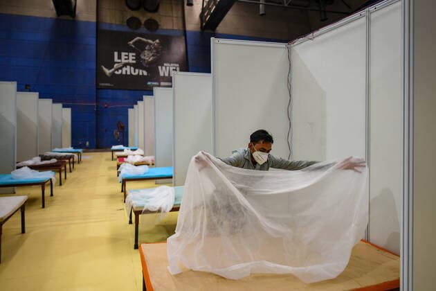 NEW DELHI, INDIA - APRIL 18: An inside view of a temporary Covid care centre set up at Commonwealth Games Village, on April 18, 2021 in New Delhi, India. (Photo by Amal KS Hindustan Times) Daily Life Amid Coronavirus Pandemic In India