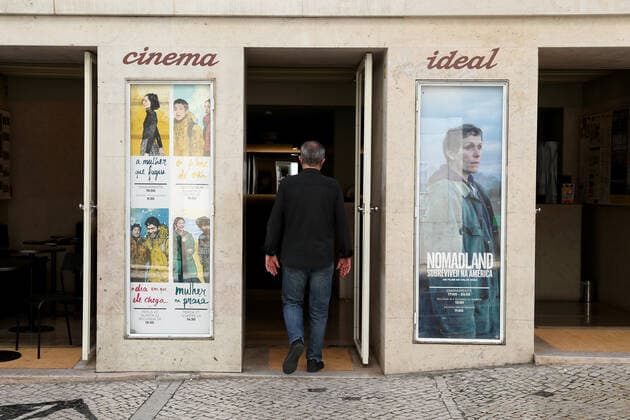 April 19, 2021, Lisbon, Portugal: A man enters the reopened Cinema IDEAL in Lisbon, Portugal on April 19, 2021. Portugal begins third phase of COVID-19 unlocking on Monday with the reopening of high schools, universities, cinemas, shopping malls and indoor areas of restaurants reopened in the vast majority of the mainland Portugal but stricter rules will stay in place in municipalities where transmission rates remain high. Lisbon Portugal - ZUMAf123 20210419_zap_f123_016 Copyright: xPedroxFiuzax
