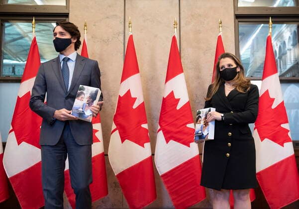 April 19, 2021, Ottawa, on, Canada: Deputy Prime Minister and Minister of Finance Chrystia Freeland stands with Prime Minister Justin Trudeau as she prepares to table the federal budget in the House of Commons in Ottawa, on Monday, April 19, 2021. Ottawa Canada  - ZUMAc35_ 20210419_zaf_c35_112 Copyright: xJustinxTangx