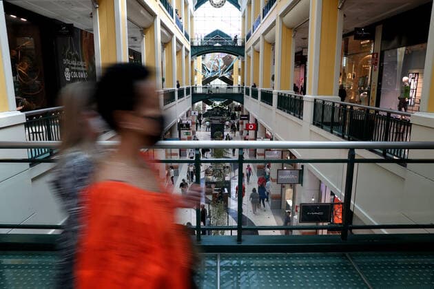 (210420) -- LISBON, April 20, 2021 -- People go shopping at the reopened Colombo shopping center in Lisbon, Portugal, on April 19, 2021. Portugal on Monday proceeded to the third stage of deconfinement, or easing of COVID-19 lockdown measures, with the gradual reopening of services and other activities in municipalities with a relatively low COVID-19 incidence rate. In most of the country, schools resumed in-person education and stores, shopping centers and restaurants reopened with occupancy restrictions and in-store health and safety measures. (Photo by Xinhua) PORTUGAL-LISBON-COVID-19-3RD PHASE UNLOCKING PedroxFiuza 
