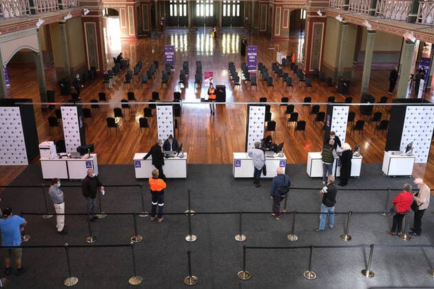 COVID19 VACCINATION ROLLOUT MELBOURNE, People attend the mass vaccination hub at the Royal Exhibition Building in Melbourne, Wednesday, April 21, 2021. Those over 70 can show up at three Victorian mass COVID-19 vaccination hubs without an appointment from Wednesday. ( NO ARCHIVING, EDITORIAL USE ONLY, NO USE IN BOOKS WITHOUT CONSENT MELBOURNE VIC AUSTRALIA  Copyright: xLUISxASCUIx 20210421001536408241