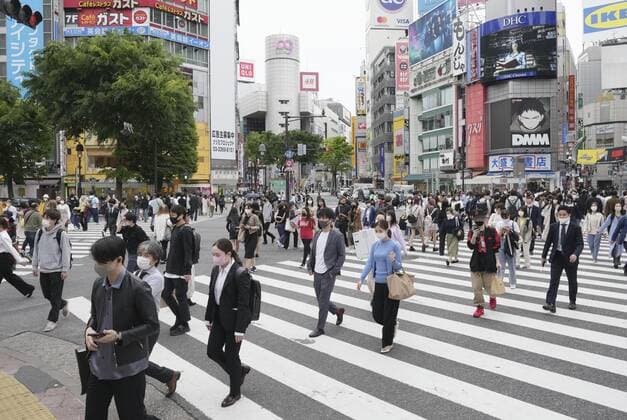 Rampant virus infections in Tokyo People wearing face masks walk in Tokyo s Shibuya area on April 22, 2021, as Tokyo Gov. Yuriko Koike calls for tougher measures to slow human traffic in view of the recent rampant virus infections in Tokyo. 