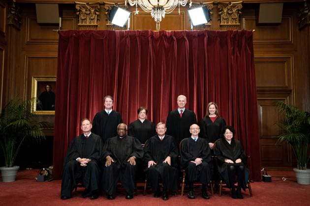 Members of the Supreme Court pose for a group photo at the Supreme Court in Washington, DC on April 23, 2021. Seated from left: Associate Justice of the Supreme Court Samuel A. Alito, Jr., Associate Justice of the Supreme Court Clarence Thomas, Chief Justice of the United States John G. Roberts, Jr., Associate Justice of the Supreme Court Stephen G. Breyer, and Associate Justice of the Supreme Court Sonia Sotomayor, Standing from left: Associate Justice of the Supreme Court Brett Kavanaugh, Associate Justice of the Supreme Court Elena Kagan, Associate Justice of the Supreme Court Neil M. Gorsuch and Associate Justice of the Supreme Court Amy Coney Barrett. Copyright: xPoolxviaxCNPx MediaPunchx