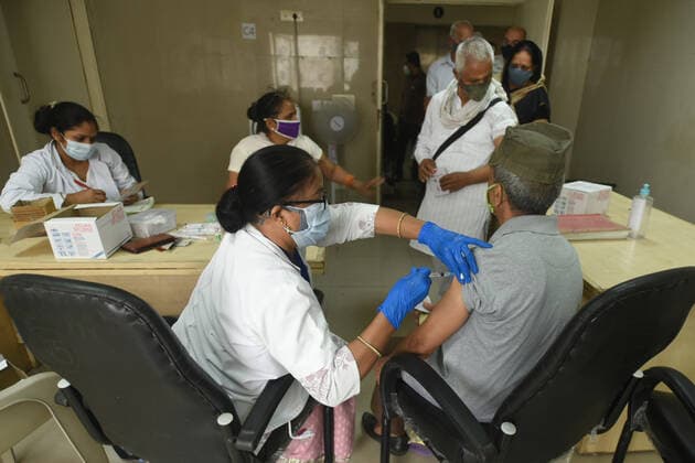 NOIDA, INDIA - APRIl 23: A man above the age of 45 being vaccinated against Covid-19, at a district hospital in sector 30, on April 23, 2021 in Noida, India. (Photo by Sunil Ghosh Hindustan Times) 4th Phase Of Covid-19 Vaccination