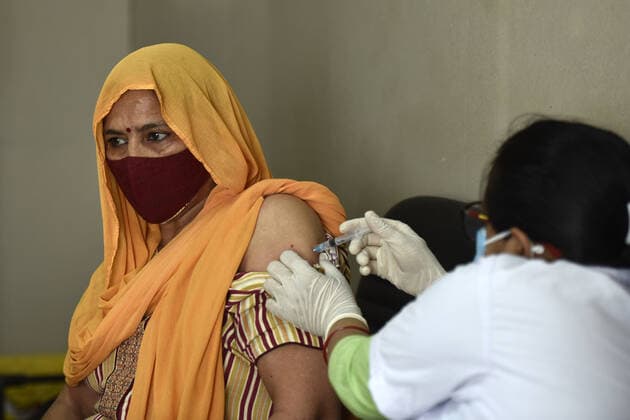 NOIDA, INDIA - APRIl 23: A woman above the age of 45 being vaccinated against Covid-19, at a district hospital in sector 30, on April 23, 2021 in Noida, India. (Photo by Sunil Ghosh Hindustan Times) 4th Phase Of Covid-19 Vaccination