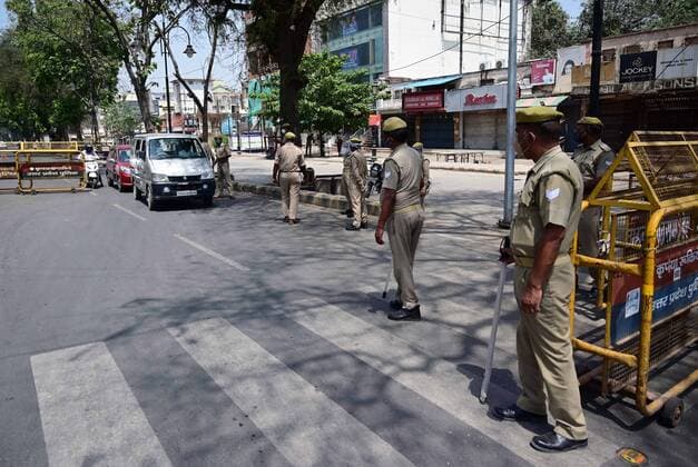 April 24, 2021, Prayagraj, Uttar Pradesh, India: Prayagraj: Police stop commuters and urge them to stay home during a weekend lockdown imposed by the government as a preventive measure against the Covid-19 coronavirus, in Prayagraj on Saturday, April 24, 2021. Prayagraj India - ZUMAv115 20210424_zap_v115_001 Copyright: xPrabhatxKumarxVermax