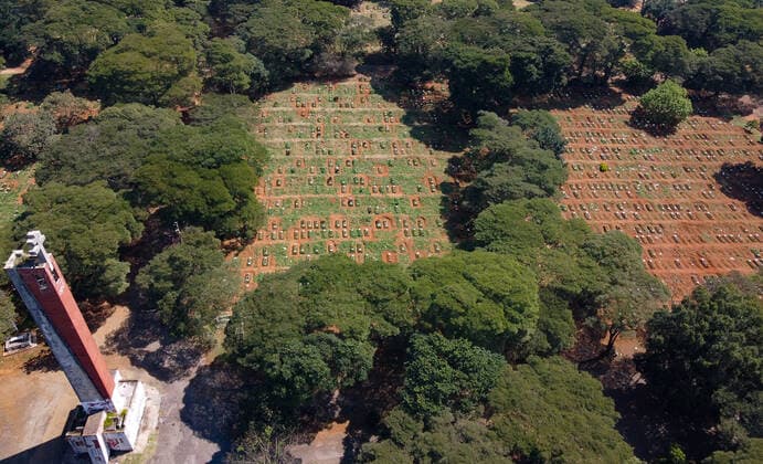 Brazil: View of the open graves at the Vila Formosa Cemetery (EDITORS NOTE: Image taken by a drone) Aerial images of the open graves at the Vila Formosa Cemetery in São Paulo. The country has recorded 2,866 deaths from Covid-19 in the past 24 hours and has totaled 386,623 deaths since the start of the pandemic. With that, the moving average of deaths in the last 7 days reached 2,514. Sao Paulo Brazil Copyright: RonaldoxSilva