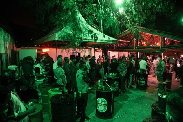 April 25, 2021, Sao Paulo, Sao Paulo, Brazil: Police officers dispersed an illegal and clandestine party in Carapicuiba (Sao Paulo) in the early hours of Sunday, 25. About 120 people were in place, most without a face shield, drinking and smoking hookah, disregarding the health conditions and failing to comply with the quarantine against Covid-19. Sao Paulo Brazil - ZUMAl146 20210425_zaf_l146_011 Copyright: xPauloxLopesx