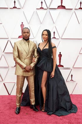 OscarÂ® nominee Leslie Odom Jr. and Nicolette Robinson arrive on the red carpet of The 93rd OscarsÂ® at Union Station in Los Angeles, CA on Sunday, April 25, 2021. Los Angeles CA USA  Copyright: xMattxPetitx 34135058THA