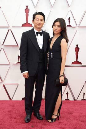 OscarÂ® nominee Steven Yeun and Joana Pak arrive on the red carpet of The 93rd OscarsÂ® at Union Station in Los Angeles, CA on Sunday, April 25, 2021. Los Angeles CA USA  Copyright: xMattxPetitx 34135158THA