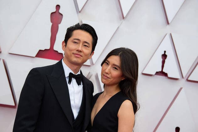 OscarÂ® nominee Steven Yeun and guest arrive on the red carpet of The 93rd OscarsÂ® at Union Station in Los Angeles, CA on Sunday, April 25, 2021. Los Angeles CA USA  Copyright: xMattxPetitx 34135361THA
