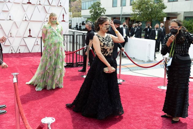 OscarÂ® nominee Emerald Fennell arrives with Han Ye-ri on the red carpet of The 93rd OscarsÂ® at Union Station in Los Angeles, CA on Sunday, April 25, 2021. Los Angeles CA USA  Copyright: xMattxSaylesx 34135569THA