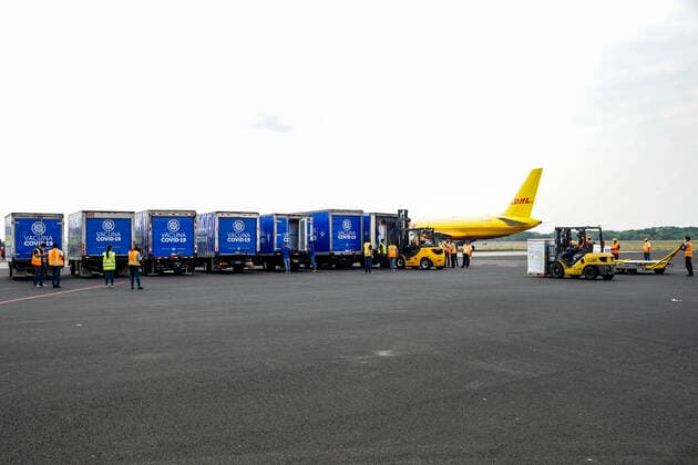April 26, 2021, San Luis Talpa, El Salvador: Trucks await to transport CORONAVAC vaccine doses during the arrival..Salvadoran President Nayib Bukele announced that the country has acquired half a million doses of the Chinese manufactured CORONAVAC COVID-19 vaccine. San Luis Talpa El Salvador - ZUMAs197 20210426_zaa_s197_098 Copyright: xCamiloxFreedmanx