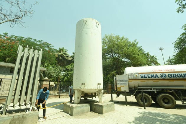 NOIDA, INDIA - APRIL 26: The Oxygen plant at the PGI located at Noida Sector 30 was not operational due to non-receipt of NOC for the last 6 year, but saw liquid oxygen being filled in its reservoir today on April 26, 2021 in Noida, India. The plant has a capacity of 10430 liters. (Photo by Sunil Ghosh Hindustan Times) India Faces Oxygen Crisis As Covid-19 Cases Mount