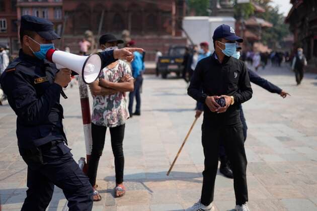 April 27, 2021, Kathmandu, Nepal: Police detain pedestrians not wearing face masks as the spread of coronavirus disease increases owing to the second wave of the virus in Kathmandu, Nepal on Tuesday, April 27, 2021. Kathmandu Nepal - ZUMAg200 20210427_zap_g200_004 Copyright: xSkandaxGautamx