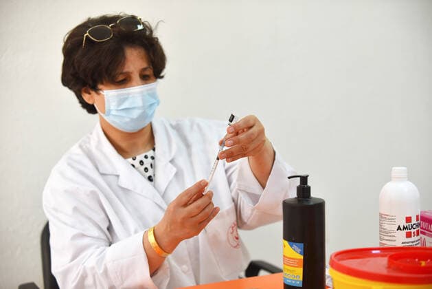 April 27, 2021, Tunis, Tunisia: A medical worker prepares a dose of the Pfizer-BioNTech COVID-19 vaccine at Ariana Youth Center as vaccination centers across the country experience an influx of registrations during Ramadan. Tunis Tunisia - ZUMAs197 20210427_zaa_s197_033 Copyright: xJdidixWassimx