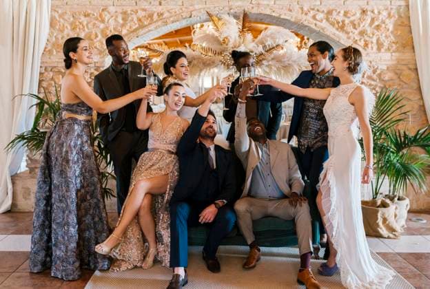 Male and female friends toasting and enjoying party at banquet model released Symbolfoto property released EGAF02292