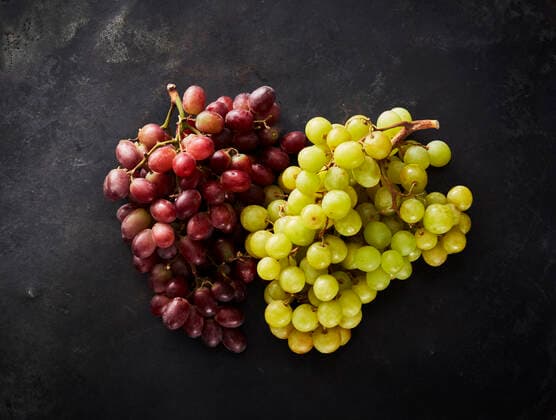 Studio shot of red and green grapes KSWF02176