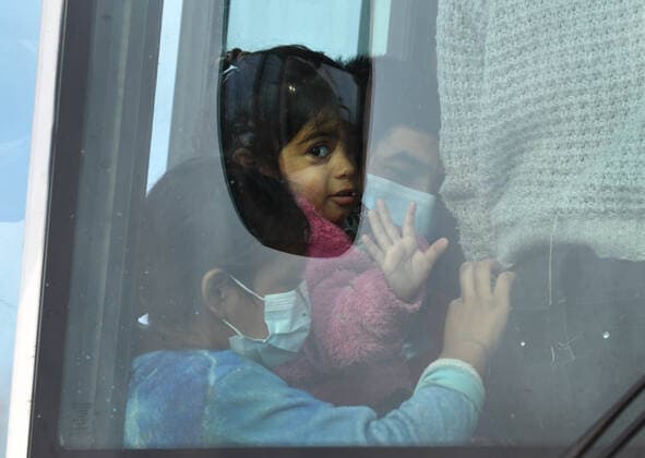 April 27, 2021, La Joya, Texas, USA: Asylum-seeking migrants are processed after crossing the border from Mexico. A surge has been overwhelming U.S. facilities at the southern borders. La Joya USA - ZUMAg208 20210427_zap_g208_012 Copyright: xCarolxGuzyx