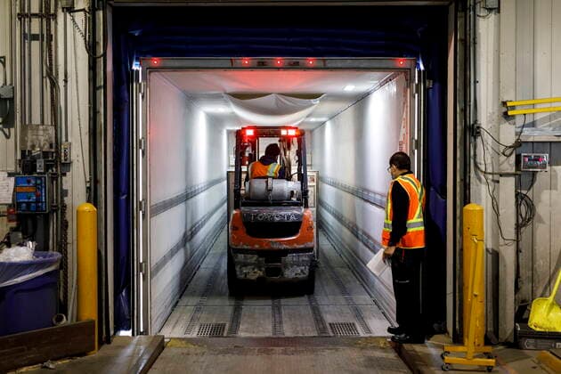 April 28, 2021, Toronto, on, Canada: Workers load a shipment of Moderna COVID-19 vaccines onto a refrigerated truck at the FedEx hub in Toronto, Wednesday, April 28, 2021. Toronto Canada  - ZUMAc35_ 20210428_zaf_c35_003 Copyright: xColexBurstonx