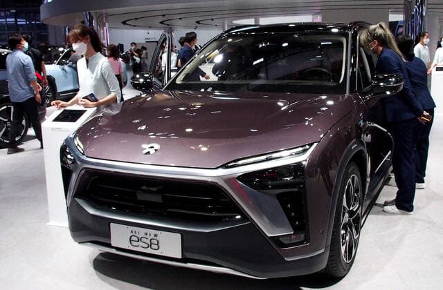 (210428) -- SHANGHAI, April 28, 2021 -- A NIO ES8 electric SUV is displayed at the 19th International Automobile Industry Exhibition (Auto Shanghai 2021) in Shanghai, east China, April 28, 2021. The 19th Shanghai International Automobile Industry Exhibition (Auto Shanghai 2021) concluded on Wednesday. The 10-day auto show, which kicked off on April 19, attracted roughly 810,000 visitors and more than 1,000 companies in the auto industry. A total of 1,310 vehicle models were displayed at the show, according to the organizer. Auto Shanghai 2021 is the first major auto show globally to run normally amid the coronavirus pandemic this year. ) CHINA-SHANGHAI-AUTO SHANGHAI-EXHIBITION (CN) ChenxFei 