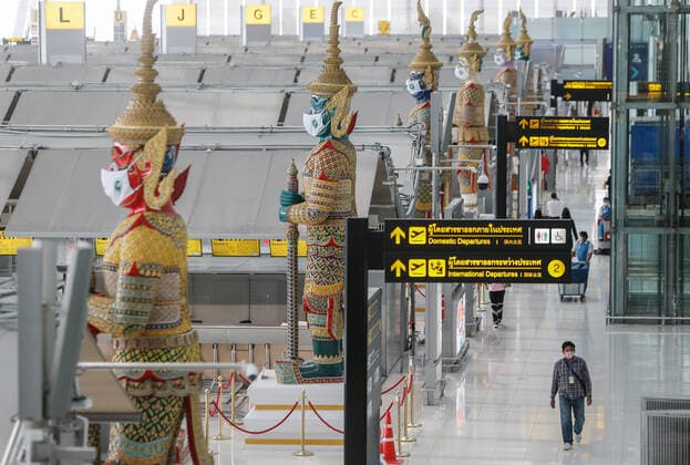 April 28, 2021, Bangkok, Thailand: Giant statues wearing face masks at Suvarnabhumi airport..Ministry of Public Health and the Airport Operation Centre set up a new vaccination centre to remedy the Covid 19 emergency situation and efficiency of vaccination for aviation-related personnel. Bangkok Thailand - ZUMAs197 20210428_zaa_s197_025 Copyright: xChaiwatxSubprasomx