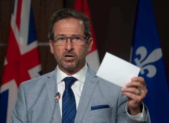 April 28, 2021, Ottawa, on, Canada: Bloc leader Yves-Francois Blanchet holds up papers as he speaks with reporters on Parliament Hill in Ottawa, Wednesday, April 28, 2021. Ottawa Canada  - ZUMAc35_ 20210428_zaf_c35_028 Copyright: xAdrianxWyldx
