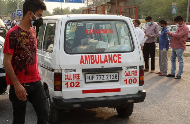 April 28, 2021, New Delhi, India: An ambulance carries a body of a covid19 for cremation at a crematorium.India faces the world fastest growing number of Covid-19 cases with 360,927 new confirmed infections, the highest single day count in the country and more than 3,293 death in the month of April 2021. New Delhi India - ZUMAs197 20210428_zaa_s197_060 Copyright: xNaveenxSharmax