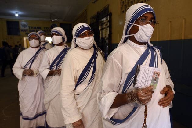 KOLKATA, INDIA - APRIL 29: Nuns of Missionaries of Charity in a queue to cast their vote during the eighth phase of West Bengal Assembly Electionss, at St. Mary s School on April 29, 2021 in Kolkata, India. Sealing the fate of West Bengal, the last of the 8-phase state elections is currently underway with 35 seats up for grabs. Results for all 294 seats will be announced on May 2. (Photo by Samir Jana Hindustan Times) Voting For Eight Phase Of West Bengal Assembly Elections