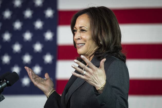 Vice President Kamala Harris speaks while visiting the M&T Bank Stadium Mass Vaccination Site on her 100th day in office in Baltimore, Maryland, on Thursday, April 29, 2021.  BAL20210429102 JIMxLOxSCALZO