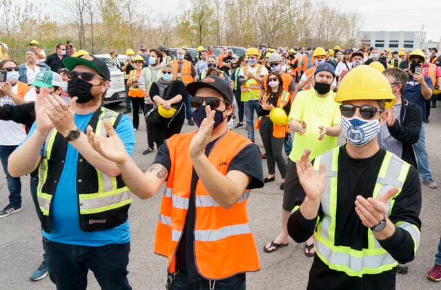 April 29, 2021, Montreal, PQ, Canada: Striking Port of Montreal dockworkers applaud speeches during a rally in Montreal on Thursday, April 29, 2021. Montreal Canada  - ZUMAc35_ 20210429_zaf_c35_065 Copyright: xPaulxChiassonx
