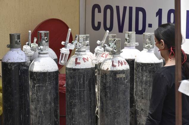 NEW DELHI, INDIA - APRIL 29: A view of reserve oxygen cylinder an isolation ward at the temporary Covid Care facility center attached to LNJP Hospital, at Shehnai Banquet on April 29, 2021 in New Delhi, India. As Covid-19 cases continued to surge in Delhi with over 97,977 active cases people are struggling to get hospital beds, ventilators, oxygen cylinders, injections and medicines with the health infrastructure in the state almost stretched to its limit. ( Photo by Sonu Mehta Hindustan Times) Temporary Covid Care Facility Centers In Delhi