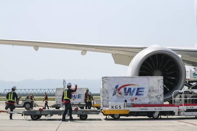 1st batch of Moderna COVID-19 vaccine arrives in Japan Photo taken at Kansai airport in Osaka Prefecture on April 30, 2021, shows cargo containing the first Japan-allocated batch of Moderna Inc. s COVID-19 vaccine unloaded from a Japan Airlines plane upon its arrival from Belgium. 