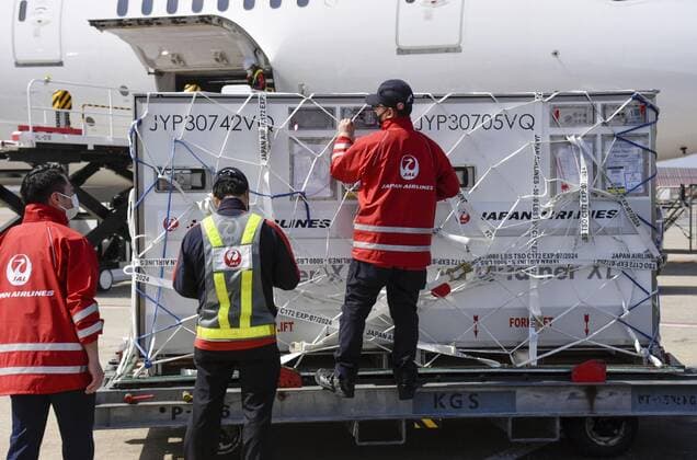 1st batch of Moderna COVID-19 vaccine arrives in Japan Photo taken at Kansai airport in Osaka Prefecture on April 30, 2021, shows cargo containing the first Japan-allocated batch of Moderna Inc. s COVID-19 vaccine unloaded from a Japan Airlines plane upon its arrival from Belgium. 