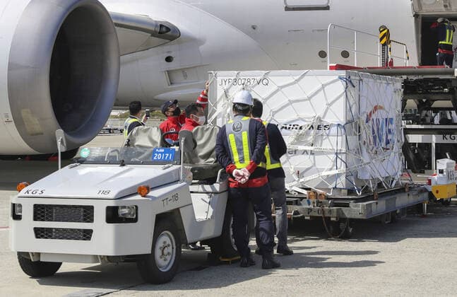 1st batch of Moderna COVID-19 vaccine arrives in Japan Photo taken at Kansai airport in Osaka Prefecture on April 30, 2021, shows cargo containing the first Japan-allocated batch of Moderna Inc. s COVID-19 vaccine unloaded from a Japan Airlines plane upon its arrival from Belgium. 