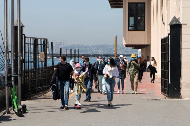 April 30, 2021, Istanbul, TUR: 17 days full lockdown officially began on Thursday evening but its impact was more evident on Friday. People walks out from the ferry during the curfew which was imposed to prevent the spread of the coronavirus disease (COVID-19) in Istanbul, Turkey on April 30, 2021. Istanbul TUR - ZUMAz112 20210430_zip_z112_009 Copyright: xJasonxDeanx