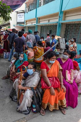 April 30, 2021, Barasat, India: People wearing masks wait to be vaccinated at the Barasat state General hospital amid the deadly second wave of COVID-19..India is reportedly running out of Covid-19 vaccines just as a virulent second wave continues to devastate the country, threatening the governmentis plans to ramp up the vaccination programme by the weekend in an effort to curb the spread of the virus. Barasat India - ZUMAs197 20210430_zaa_s197_033 Copyright: xDipayanxBosex