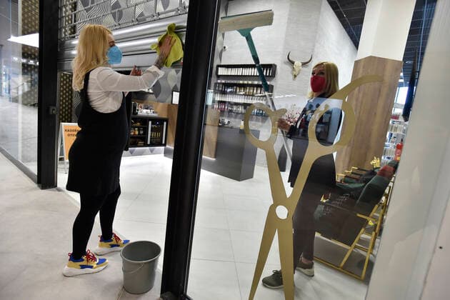A hairdresser Kristyna Humlova prepares her salon in the Futurum shopping mall in Brno, for reopening as further coronavirus lockdown restrictions are lifted in Czech Republic. Hairdressers, cosmetics, massage, animal care and similar services can reopen in Czechia as of May 3 amid the improving coronavirus epidemic situation. (CTKxPhoto VaclavxSalek) CTKPhotoP2021043007189  sal 11