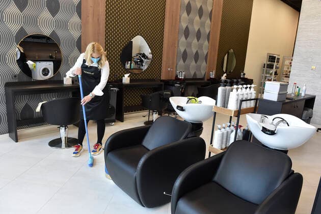 A hairdresser Kristyna Humlova prepares her salon in the Futurum shopping mall in Brno, for reopening as further coronavirus lockdown restrictions are lifted in Czech Republic. Hairdressers, cosmetics, massage, animal care and similar services can reopen in Czechia as of May 3 amid the improving coronavirus epidemic situation. (CTKxPhoto VaclavxSalek) CTKPhotoP2021043007197  sal 01