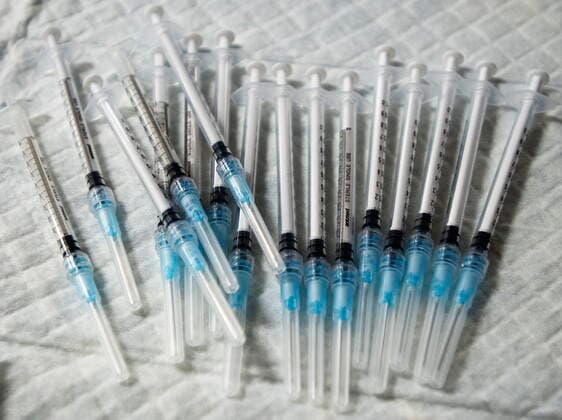 April 30, 2021, Montreal, PQ, Canada: Syringes are readied at a COVID-19 mobile vaccination clinic for members of First Nations and their partners, Friday, April 30, 2021 in Montreal. Montreal Canada  - ZUMAc35_ 20210430_zaf_c35_003 Copyright: xRyanxRemiorzx