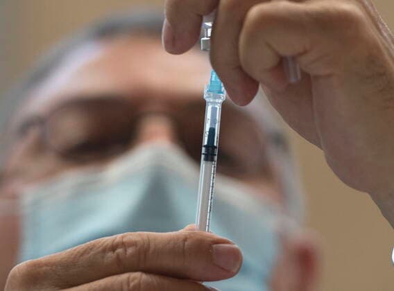 April 30, 2021, Montreal, PQ, Canada: Jose Marchand prepares Pfizer COVID-19 vaccination doses at a mobile clinic for members of First Nations and their partners, in Montreal, Friday, April 30, 2021. Montreal Canada  - ZUMAc35_ 20210430_zaf_c35_014 Copyright: xRyanxRemiorzx