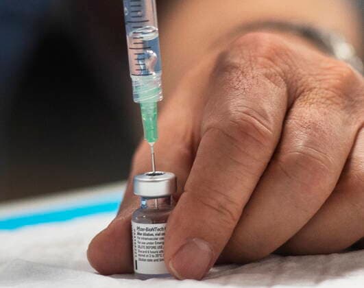 April 30, 2021, Montreal, PQ, Canada: A dose of the Pfizer COVID-19 vaccination is prepared at a mobile clinic for members of First Nations and their partners, in Montreal, Friday, April 30, 2021. Montreal Canada  - ZUMAc35_ 20210430_zaf_c35_015 Copyright: xRyanxRemiorzx