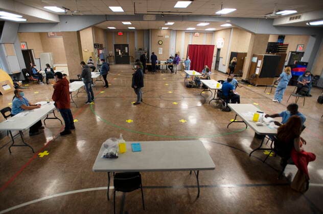 April 30, 2021, Montreal, PQ, Canada: People get the COVID-19 vaccination at a mobile clinic for members of First Nations and their partners, in Montreal, Friday, April 30, 2021. Montreal Canada  - ZUMAc35_ 20210430_zaf_c35_013 Copyright: xRyanxRemiorzx