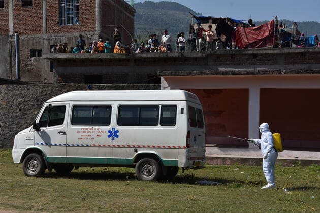May 1, 2021, Poonch, Jammu and Kashmir, India: A health worker wearing a PPE gear sanitized an ambulance in Mendhar area of Poonch of Jammu nd kashmir on Saturday Poonch India - ZUMAk155 20210501_zip_k155_002 Copyright: xNazimxAlixKhanx